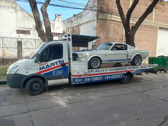 Traslado vehicular con grúa hidráulica